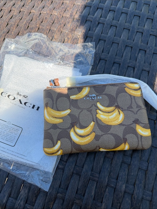 Coach Handbags - NWT Coach Brown Signature Banana Zip Pouch